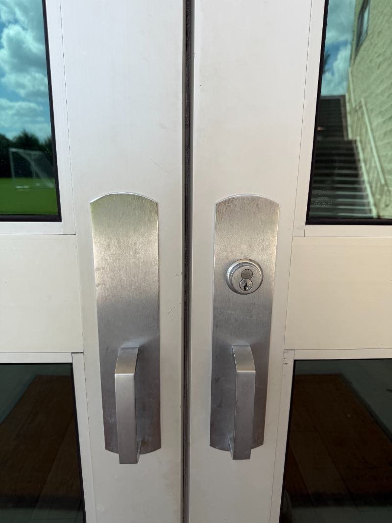 Commercial double doors with panic bars installed by A1 Security in Dallas